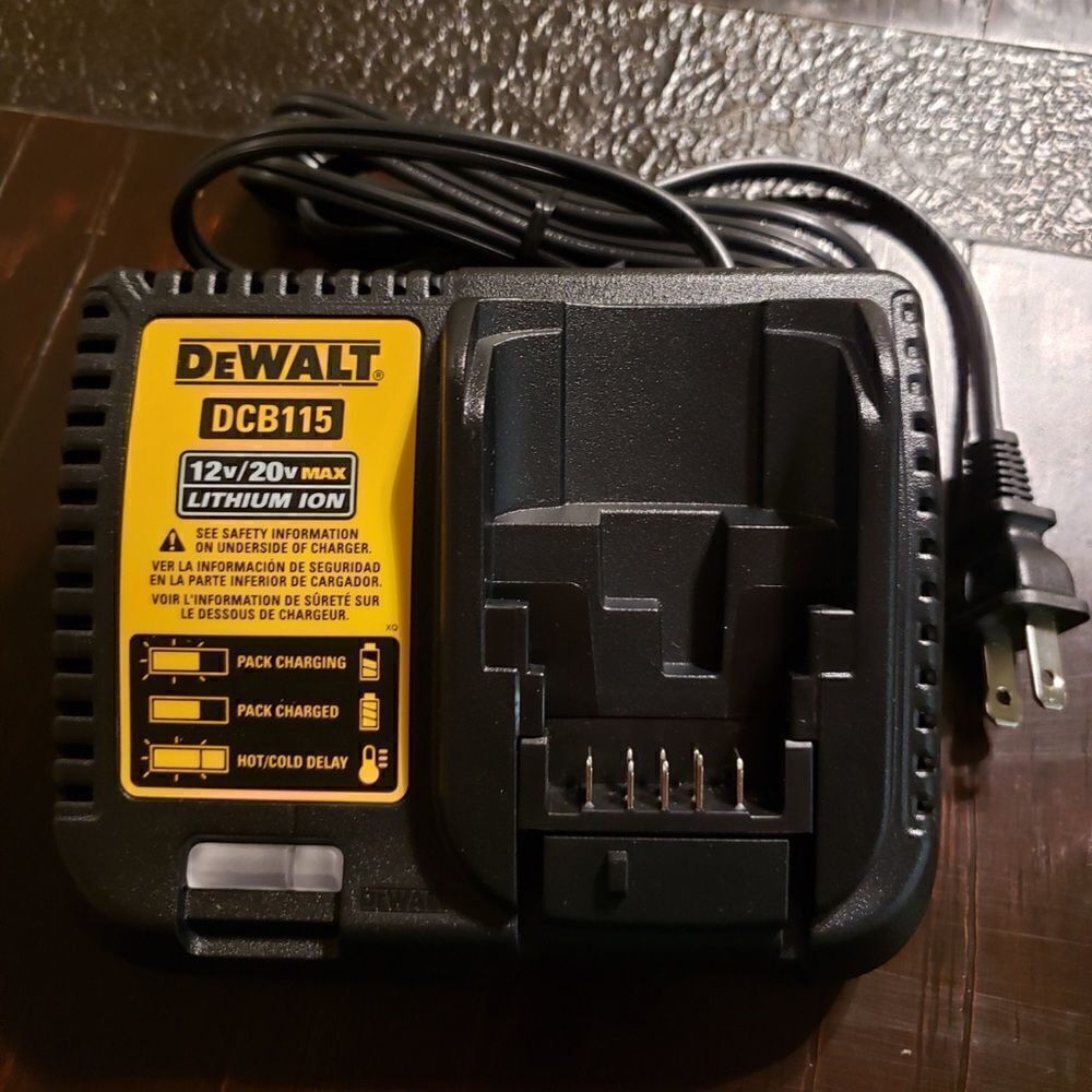 - Dewalt charger DCB115, new.